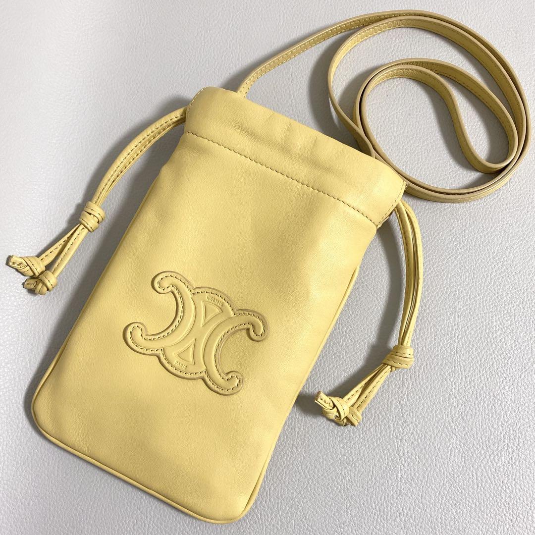 CELINE / キュイルトリオンフ ドローストリングモバイルポーチ イエロー