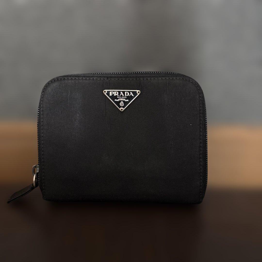 PRADA 二つ折り財布 レザー サフィアーノ 三角ロゴ ブラック 黒