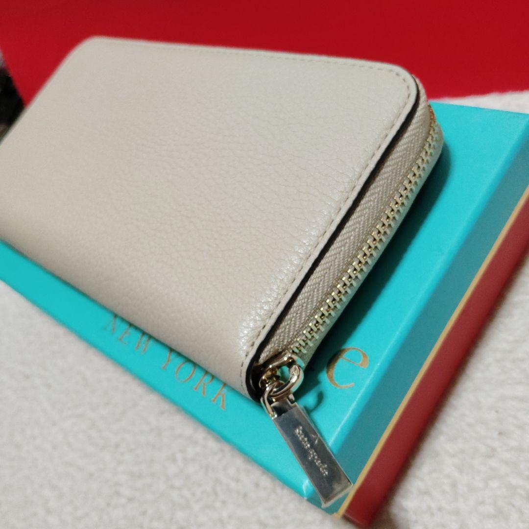 新品kate spadeケイトスペードレイラ　ベージュ 長財布　白バイカラーUS