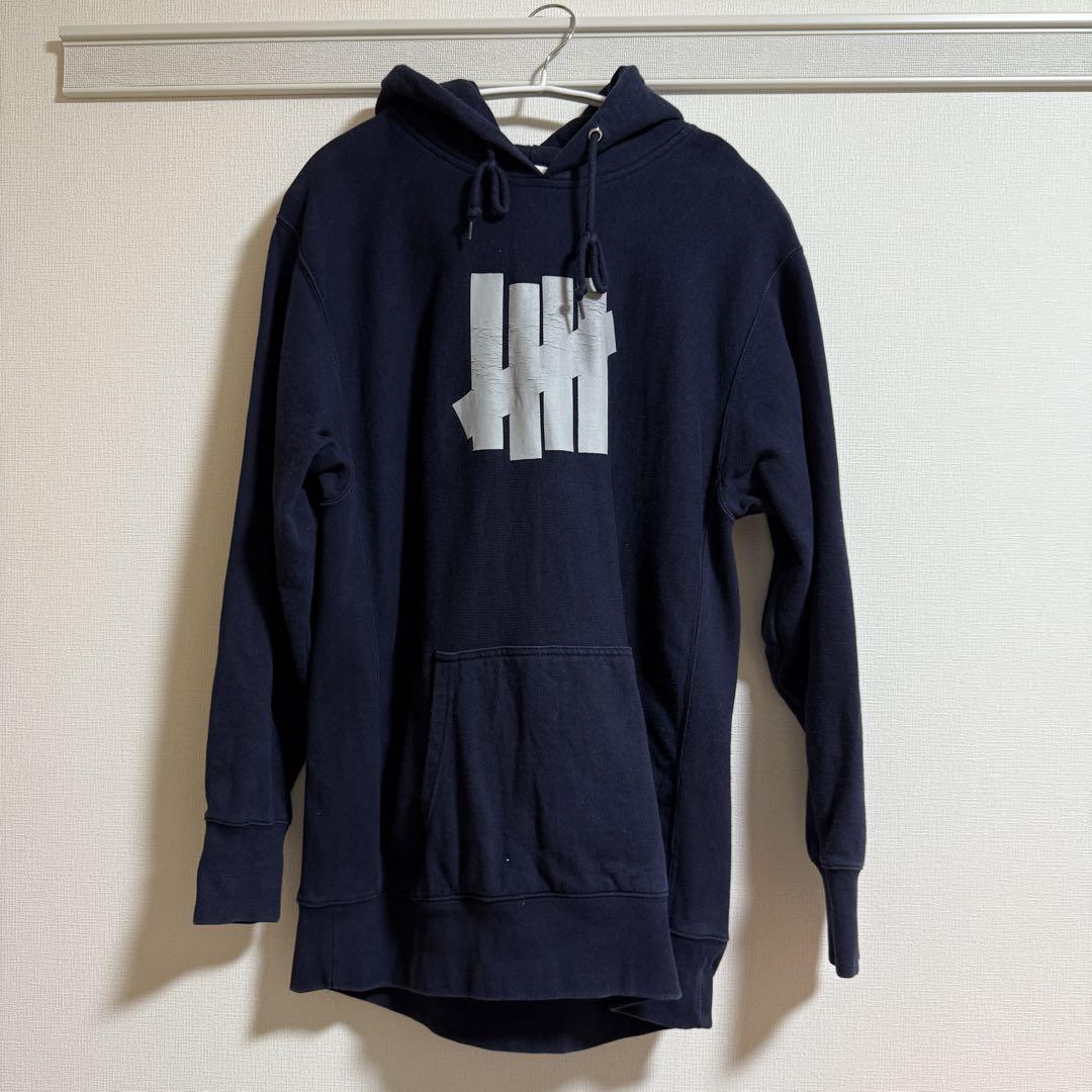 Undefeated パーカー L ネイビー
