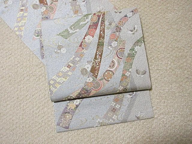 袋帯・熨斗目と花と鶴・シルバーカラー・正絹・美品・未使用・六通・M54