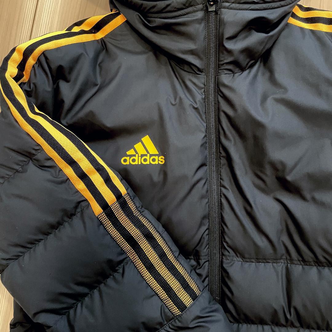 adidas ロングダウンコート ティロ21 L ブラック×ソーラーゴールド