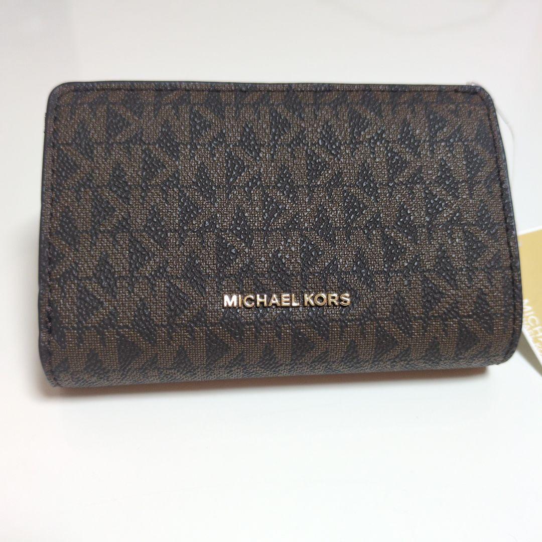MICHAEL KORS 二つ折り財布 ブラウン - メルカリ MICHAEL KORS 二つ折り財布 ブラウン - メルカリ