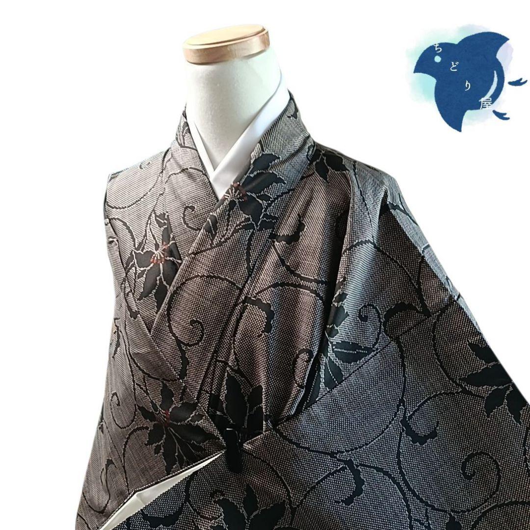 C69 ちどり屋 証紙 着物 大島紬 花 モダン 茶目立った傷や汚れなし