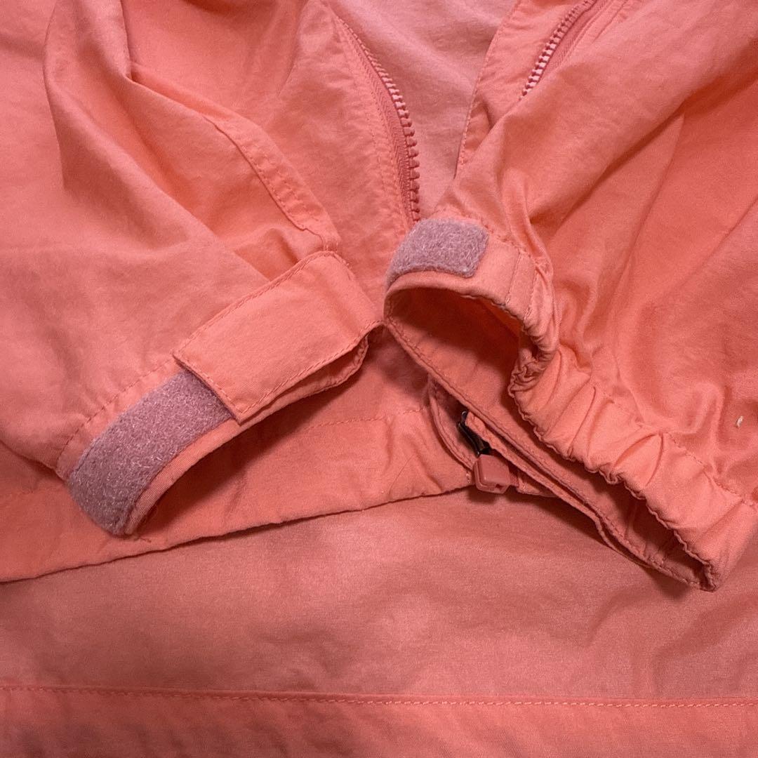 THE NORTH FACE フード付きウィンドブレーカー オレンジ