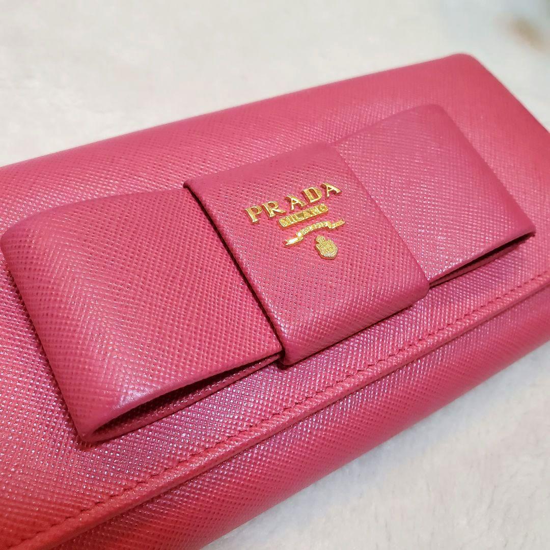 美品　プラダ　長財布 サフィアーノ フィオッコ ブルー メタルロゴ リボン