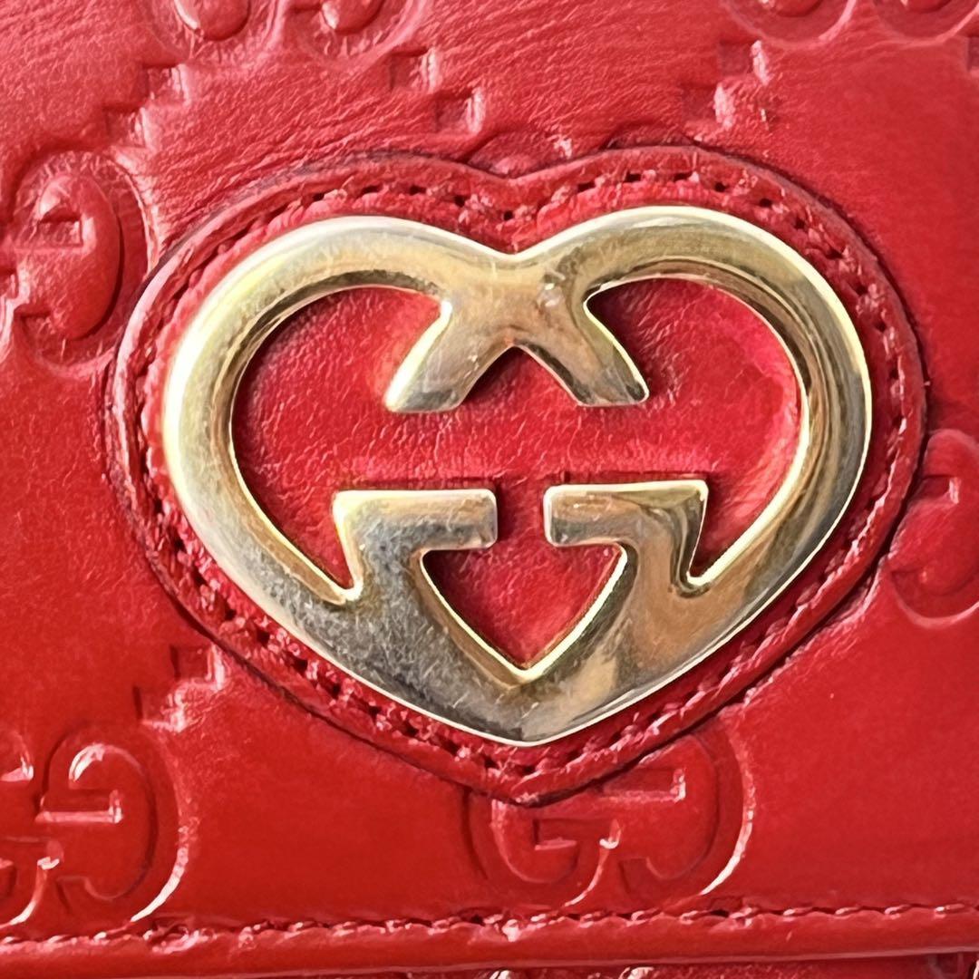 美品✨GUCCI 長財布　ラブリーハート　シマ　レッド　レディース　ロゴ金具