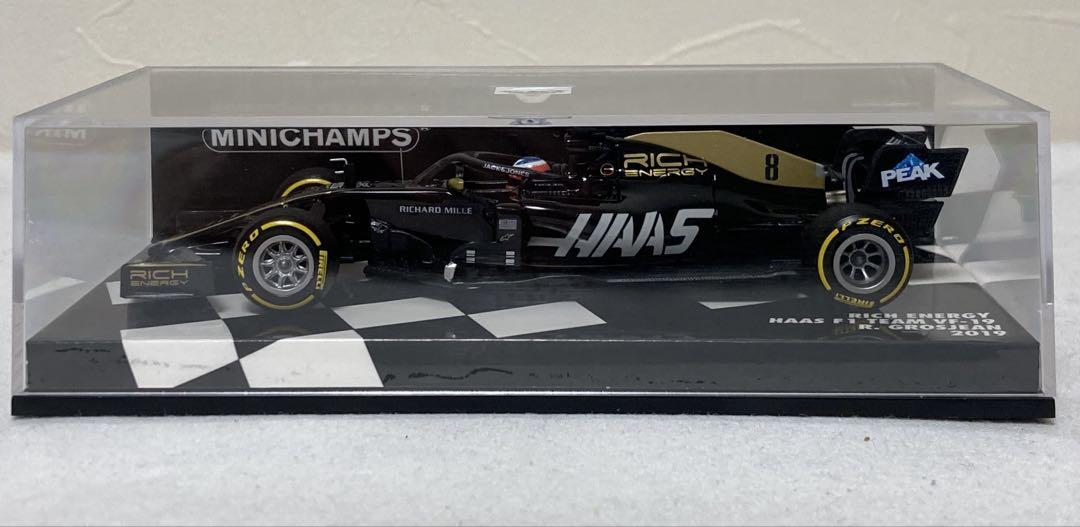 新品登場 ミニチャンプスリッチエナジー ハースF1 ロマングロー VF-19 ミニカー