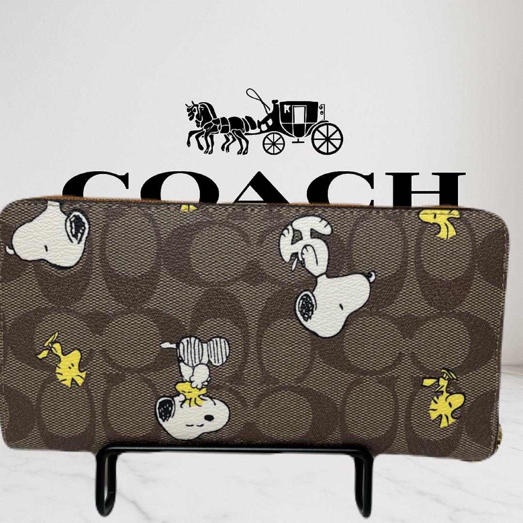 本日23時までの特別価格！COACH スヌーピー 長財布 ブラウンCE705