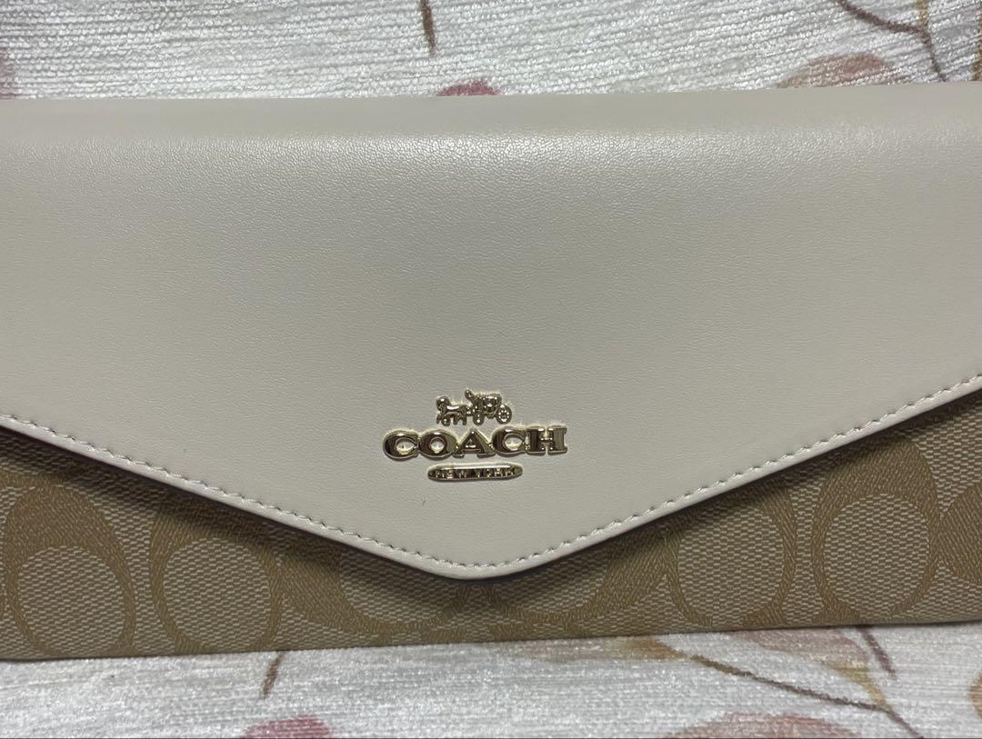 COACH☆価格66000円☆エンベロープ ウォレット・シグネチャー キャンバス