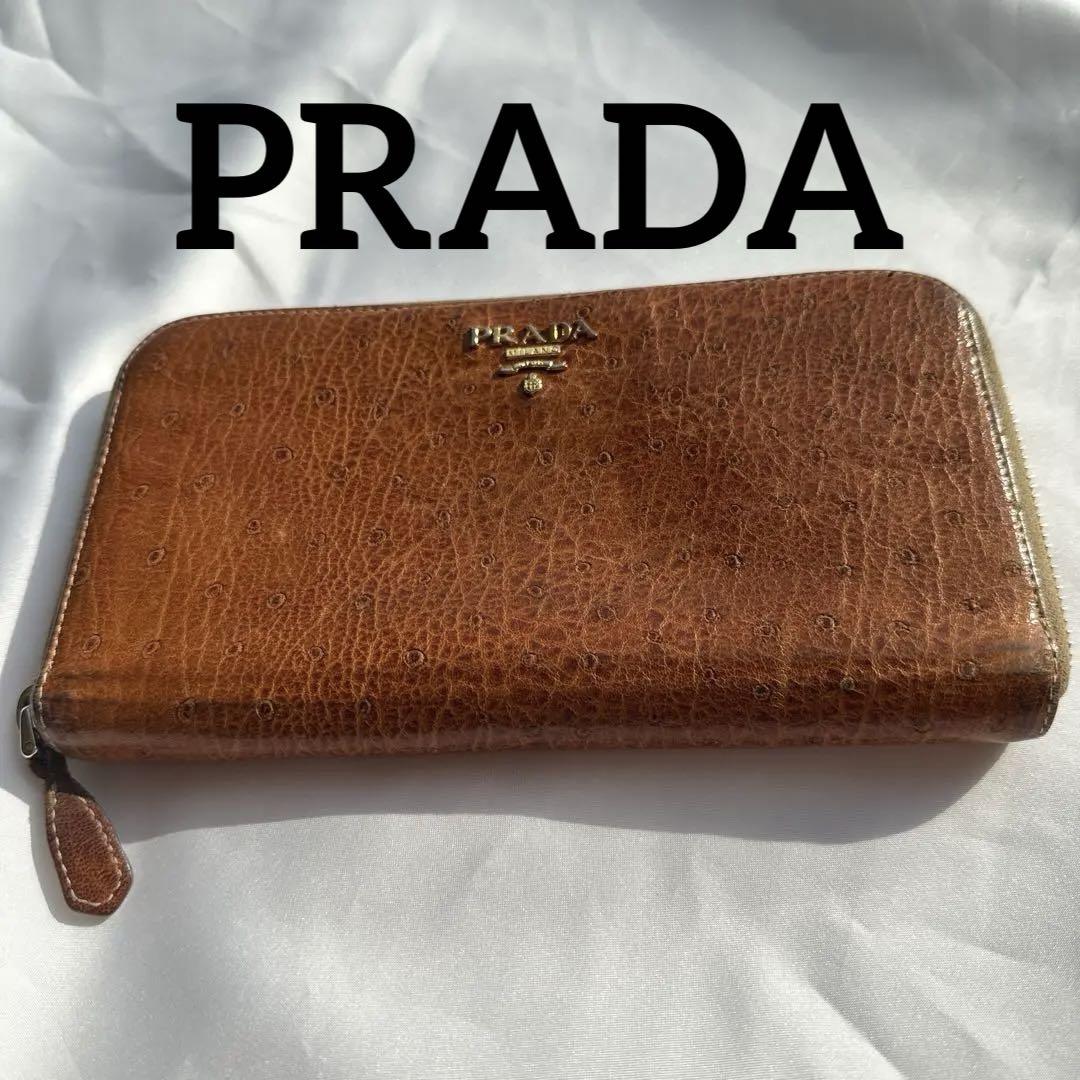 PRADA プラダ 長財布 ラウンドファスナー 茶　金　ロゴ　レザー