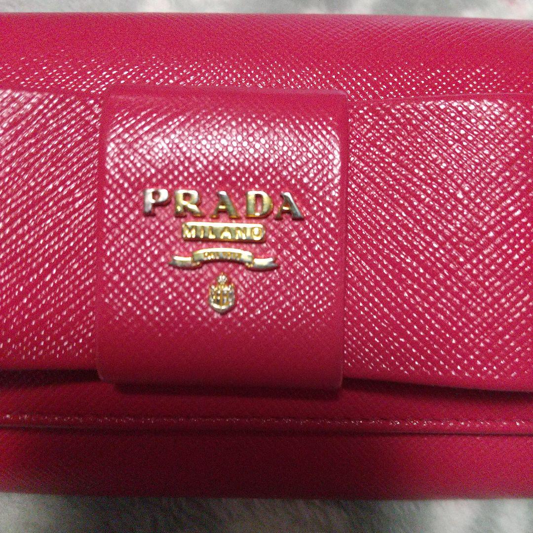 PRADA プラダサフィアーノリボン付き赤長財布