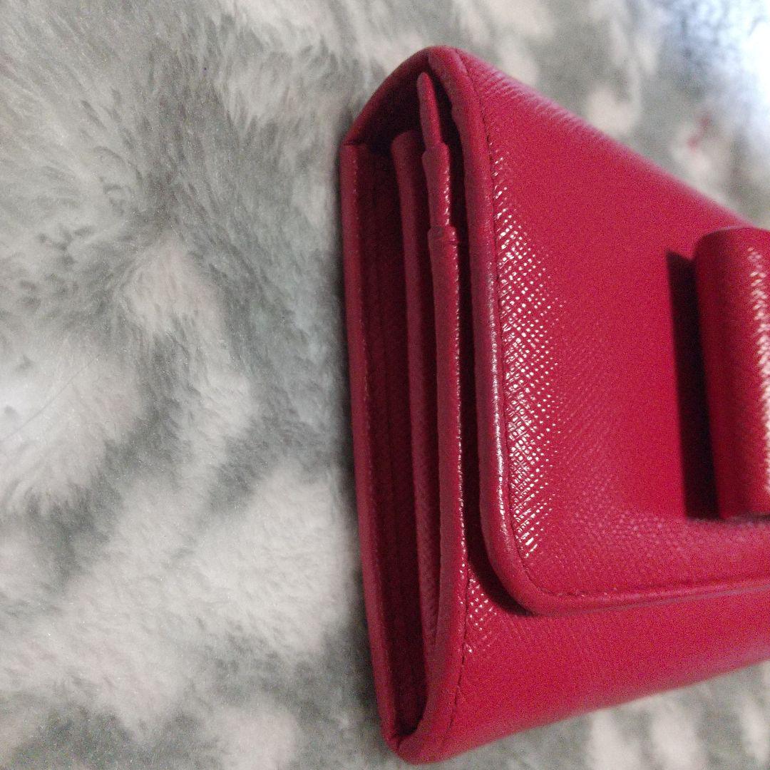 PRADA プラダサフィアーノリボン付き赤長財布