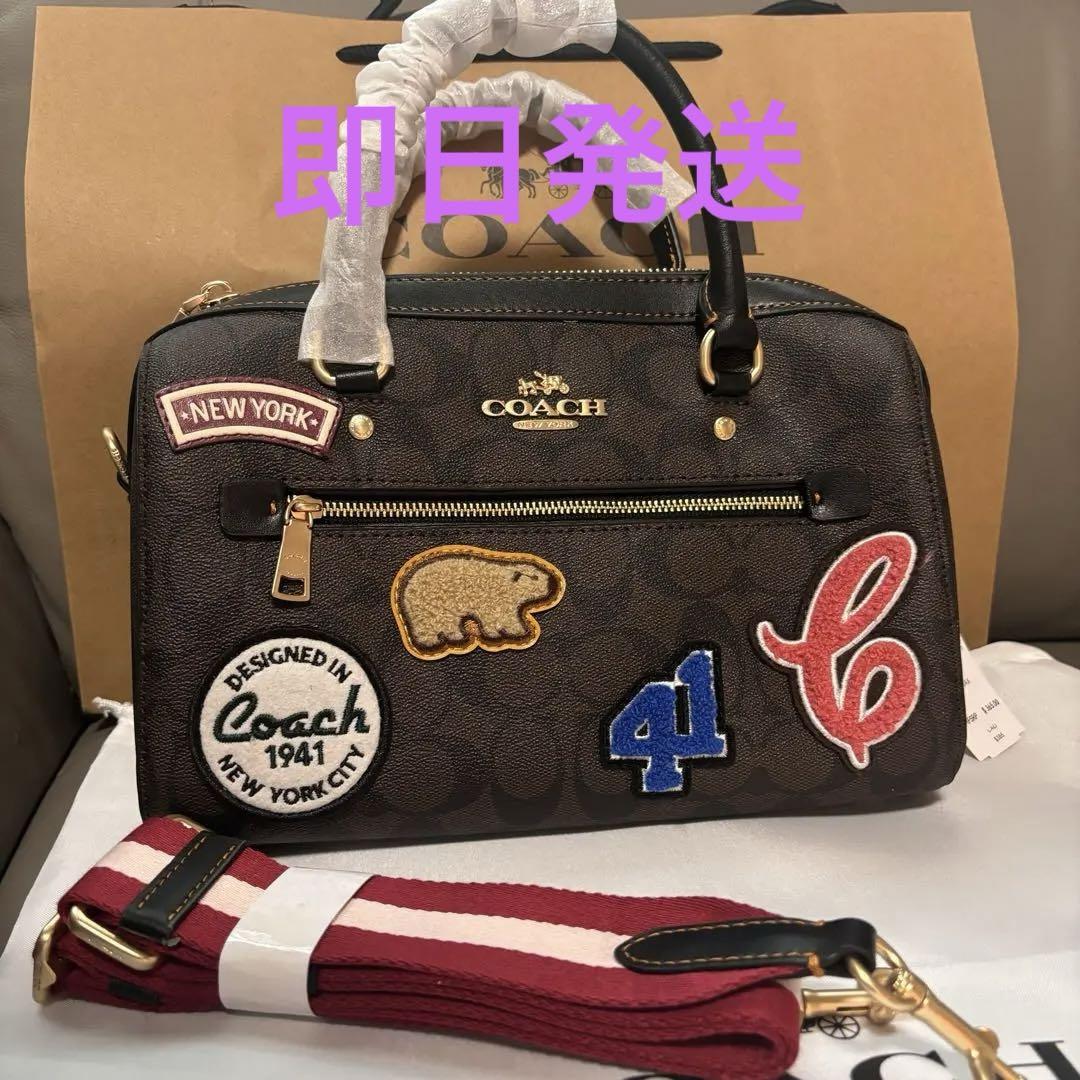 coach ローアン サッチェル・シグネチャー キャンバス・スキー パッチ