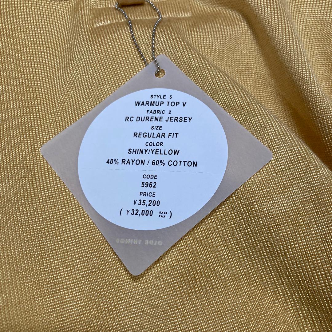 MEDIUMミディアムスポーツウェア　 Vネック プルオーバー　イエロー