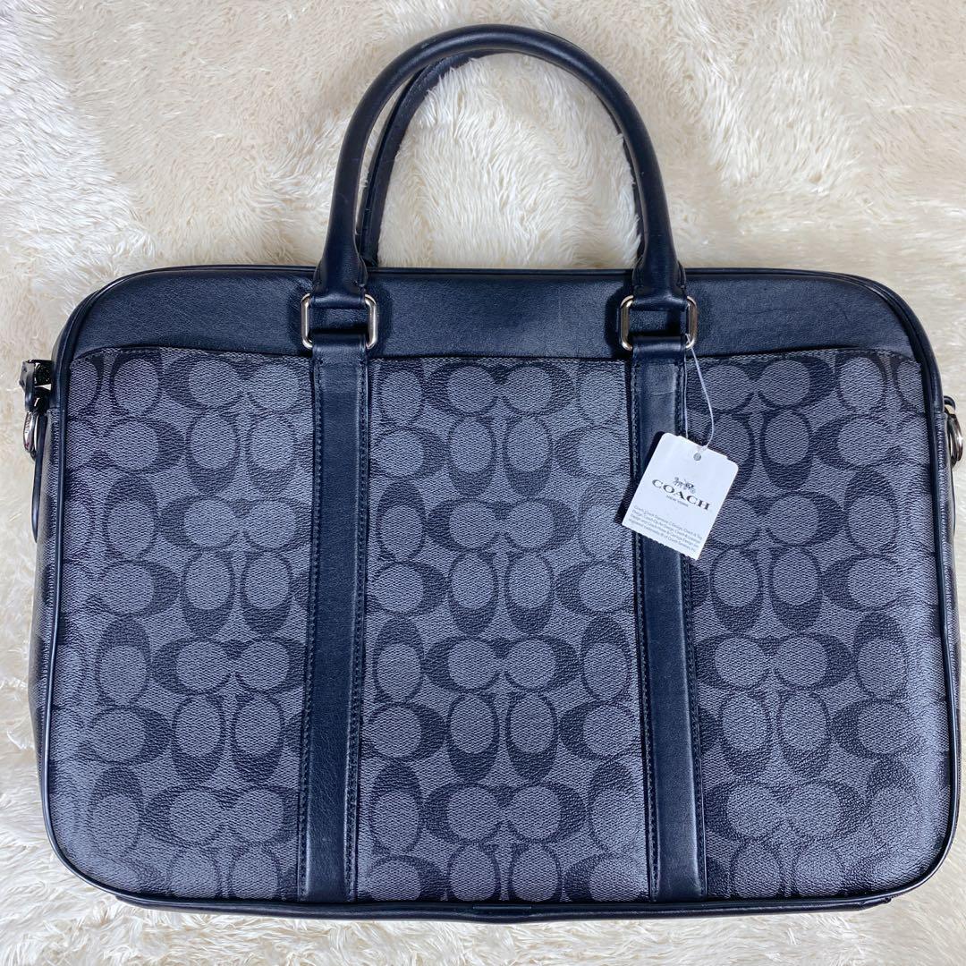 COACH コーチ ビジネスバッグ PVC レザー シグネチャー 柄　黒　美品