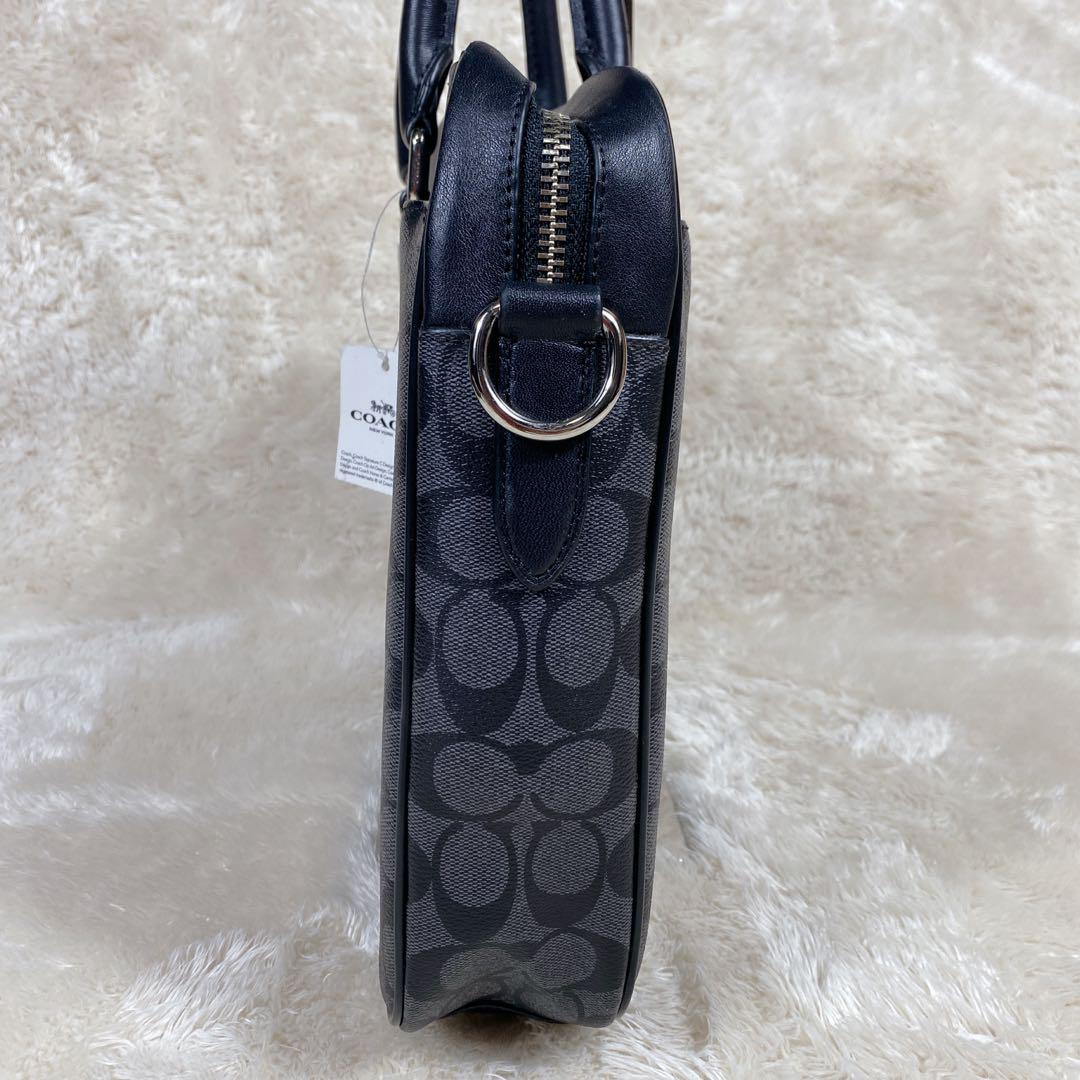 COACH コーチ ビジネスバッグ PVC レザー シグネチャー 柄　黒　美品