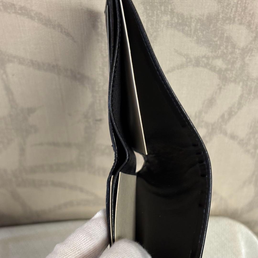 新品GUCCI グッチ　ブラックレザー 二つ折り財布Gロゴ　 札入れ　R