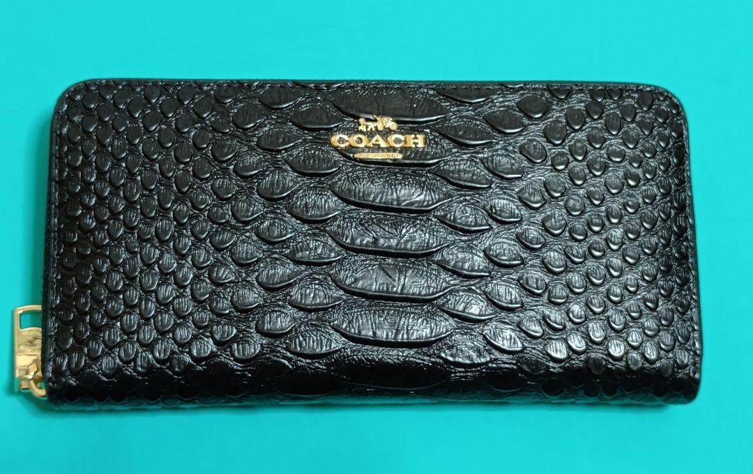 COACH エンボスドスネーク レザー 長財布 ブラック - メルカリ