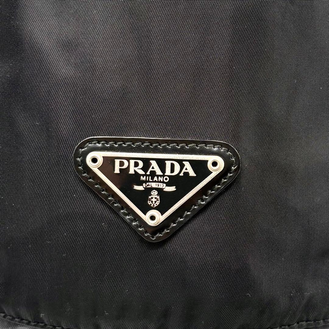 極美品✨プラダ ポーチ 巾着型 ナイロン レザー 三角ロゴ 白タグ ブラック 黒 極美品✨プラダ ポーチ 巾着型 ナイロン レザー 三角ロゴ 白タグ ブラック 黒