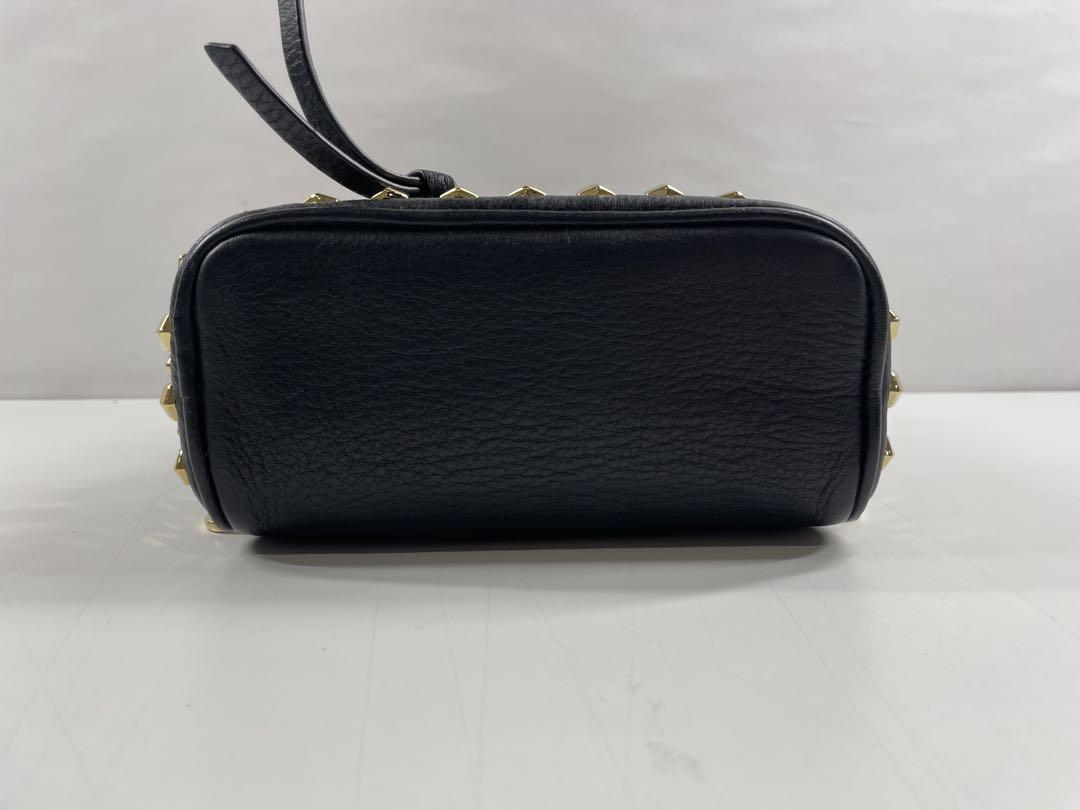 MICHAEL KORS スタッズ付きリュック&二つ折り財布