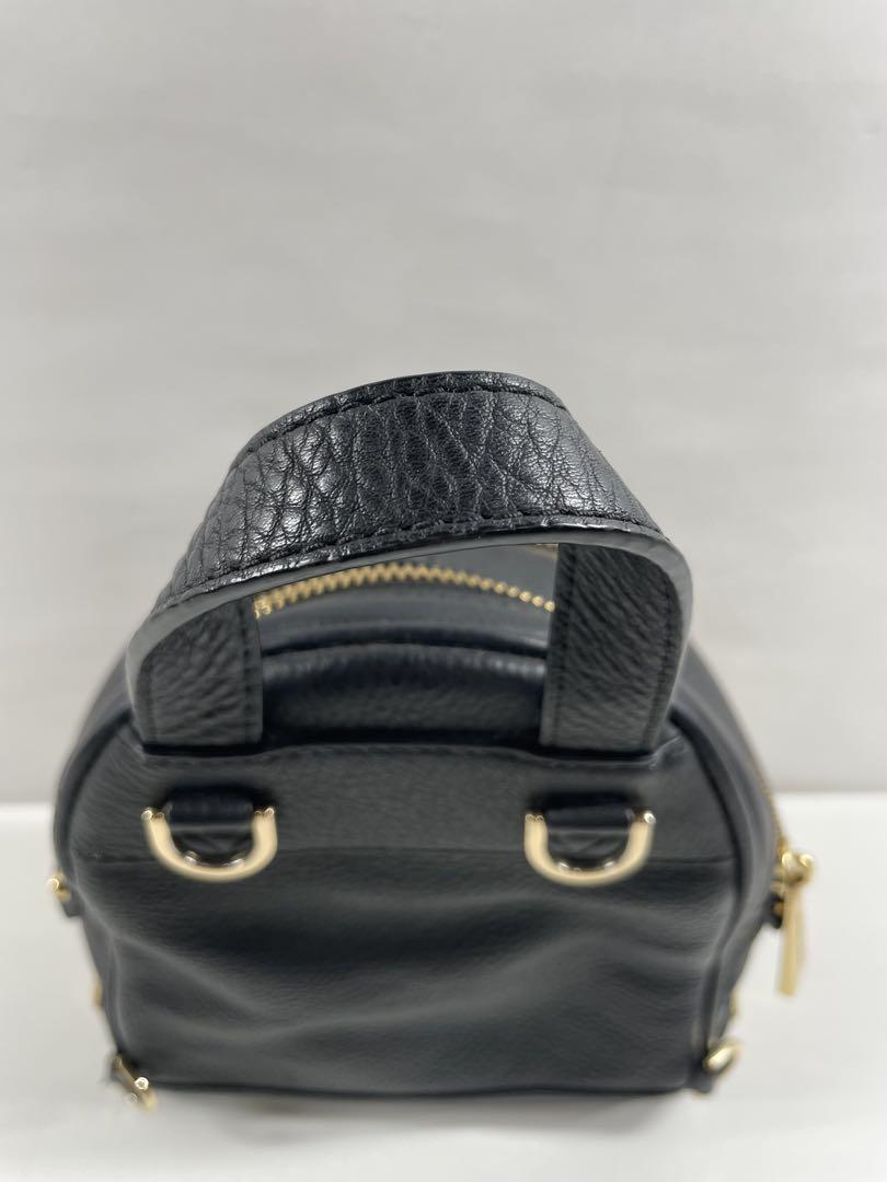 MICHAEL KORS スタッズ付きリュック&二つ折り財布