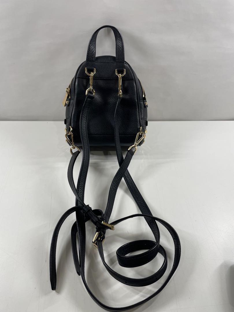 MICHAEL KORS スタッズ付きリュック&二つ折り財布