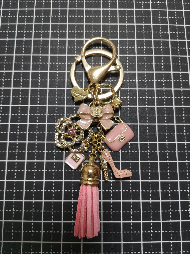 ハンドメイドチャーム キーホルダー キラキラカメリア タッセル