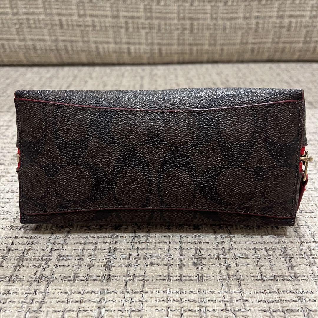 COACH ポーチ ロゴ ブラウン レッド - メルカリ