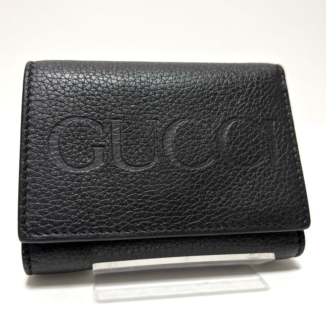 082✨美品✨GUCCI グッチ 三つ折り財布 エンボスロゴ レザー ブラック