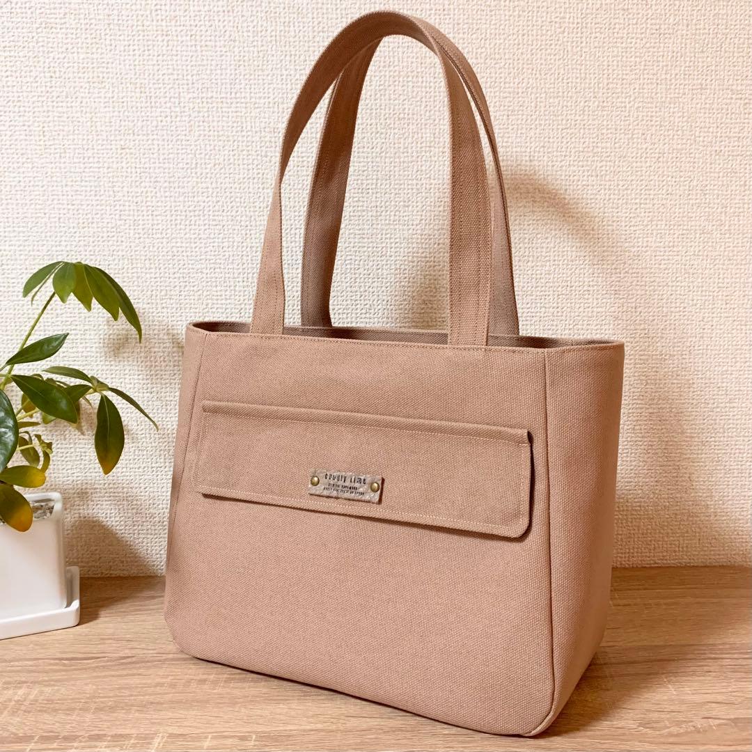 倉敷8号帆布　ラウンドトートバッグ　開け口ファスナー　フラップ片玉縁ポケット