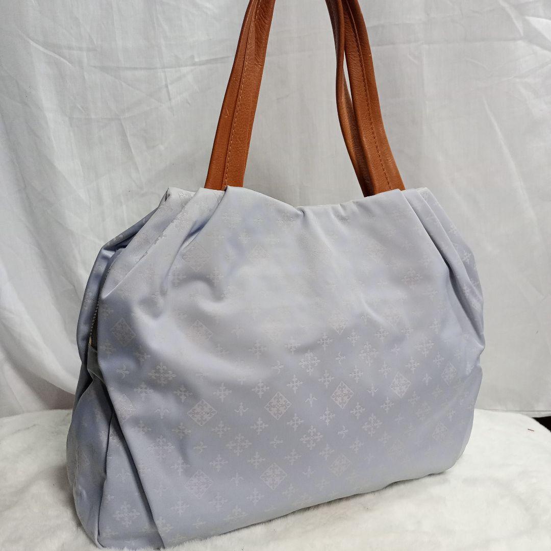美品】ラシットショルダーバッグカラーハンドル - メルカリ