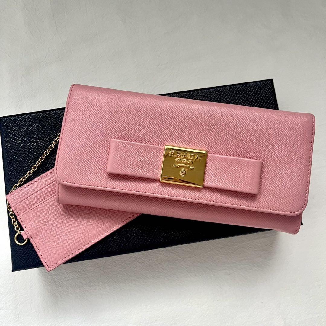 PRADA 二つ折り長財布 サフィアーノレザー ピンク リボン
