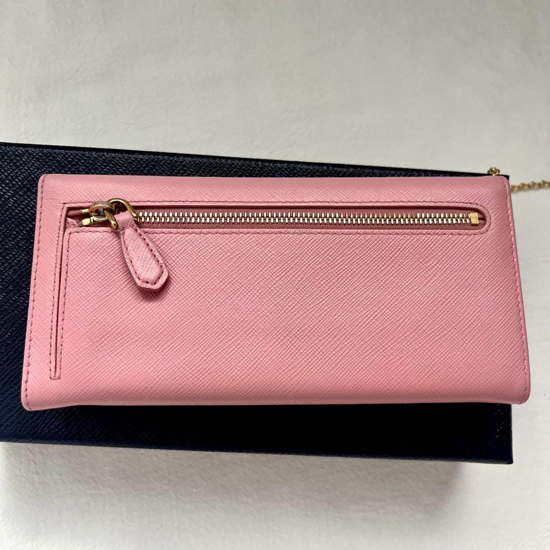 PRADA 二つ折り長財布 サフィアーノレザー ピンク リボン