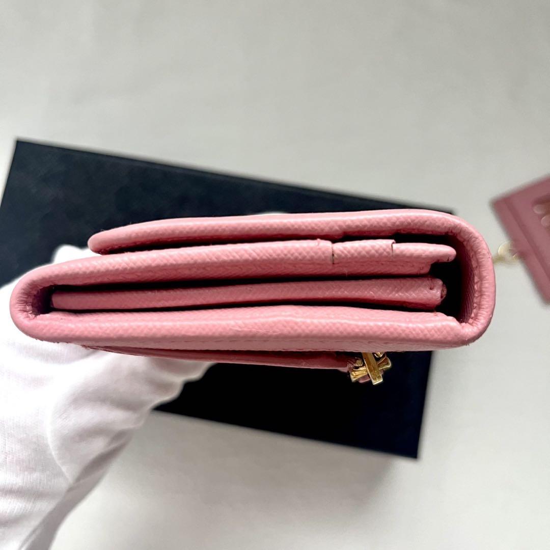 PRADA 二つ折り長財布 サフィアーノレザー ピンク リボン