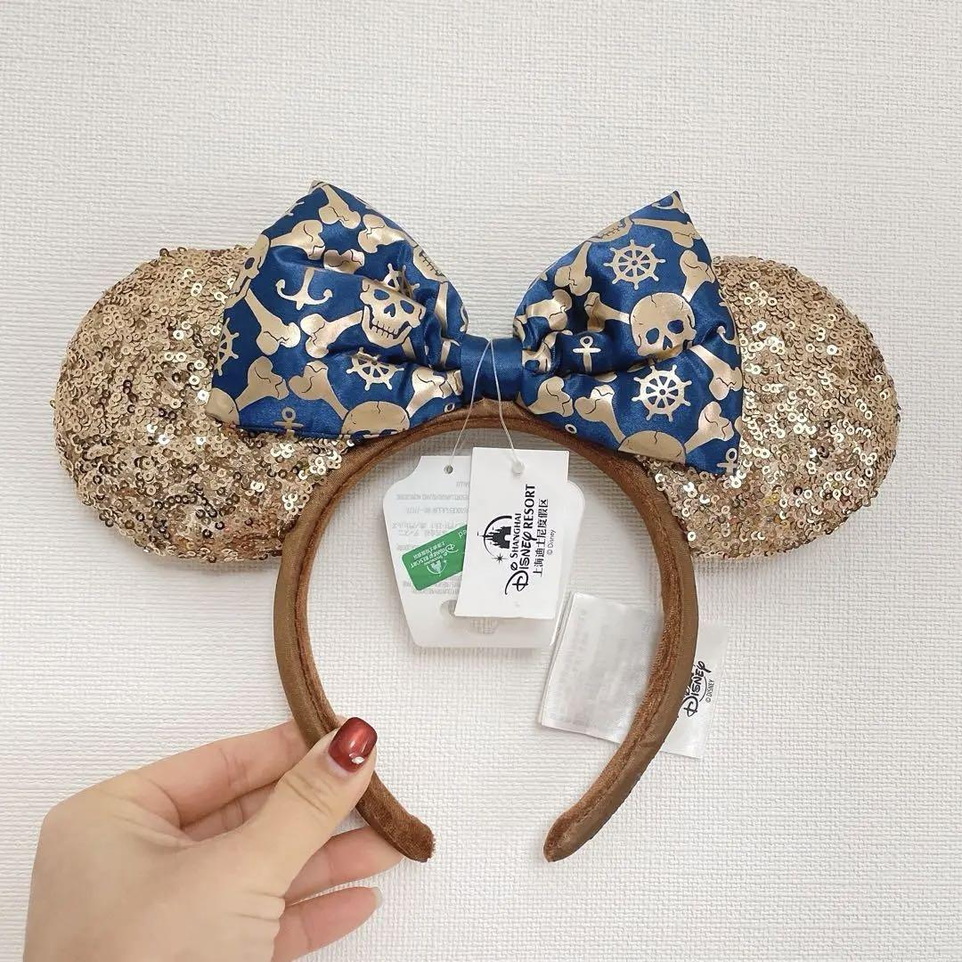 上海ディズニーランド ツイルパールリボン パール カチューシャ - メルカリ - ヘアアクセサリー