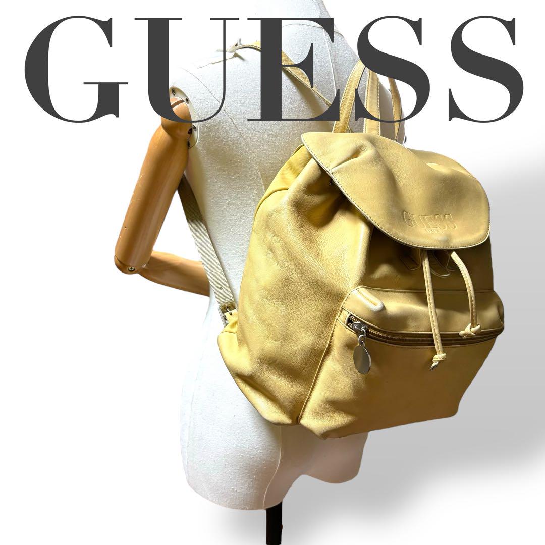 GUESS ゲス リュックサック レザー イエロー ロゴ型押し