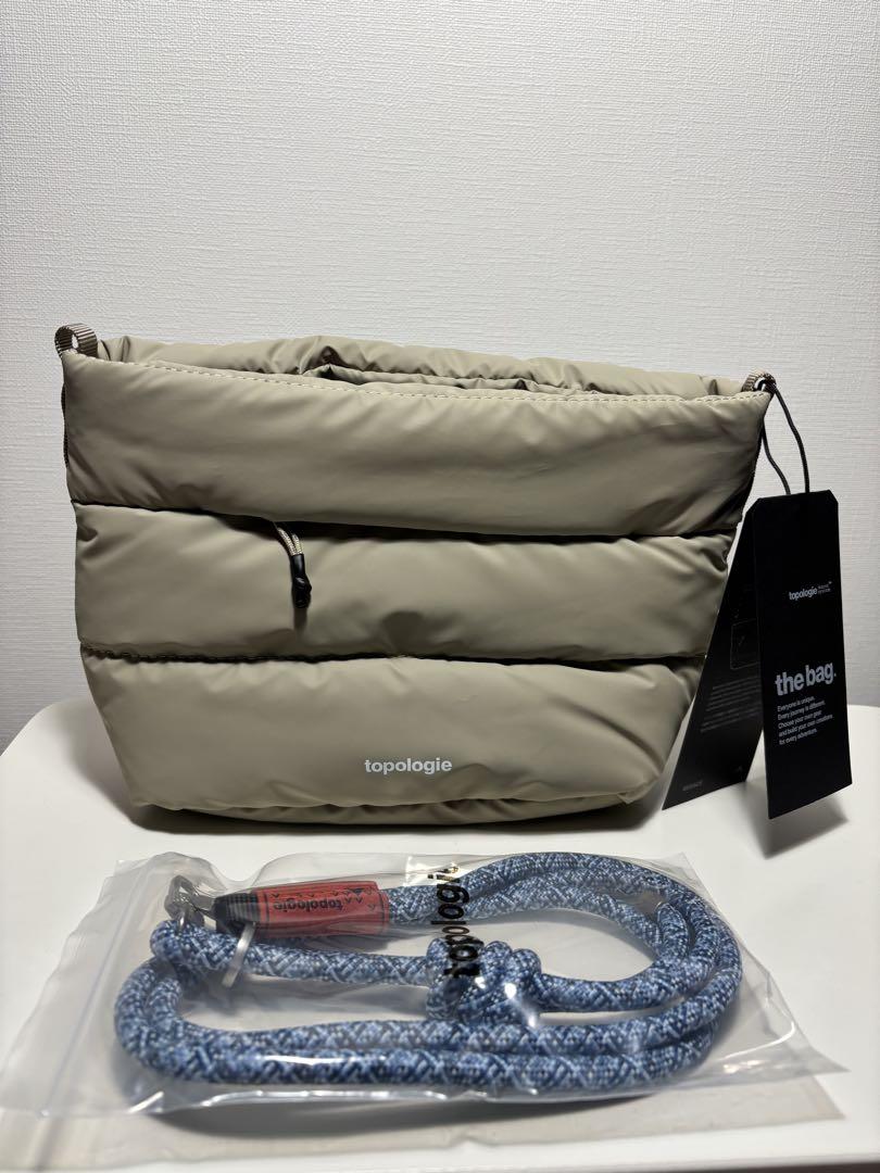 アメージングタイランド・グランドセール 新品未使用】べサス ストラップ付き外包装袋にはトポロジーのロゴが バッグ