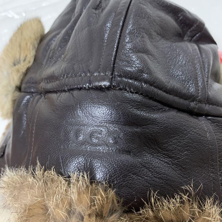 UGG AUSTRALIA LEATHER EAR HAT FLAP