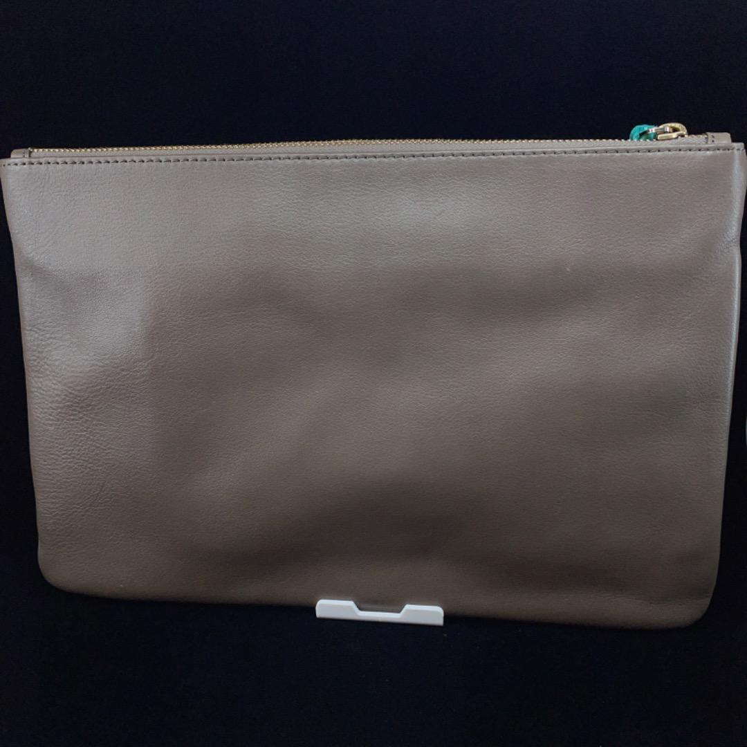 54%OFF!】 8623 レザークラッチバッグ タッセル フリンジ リボンロゴ