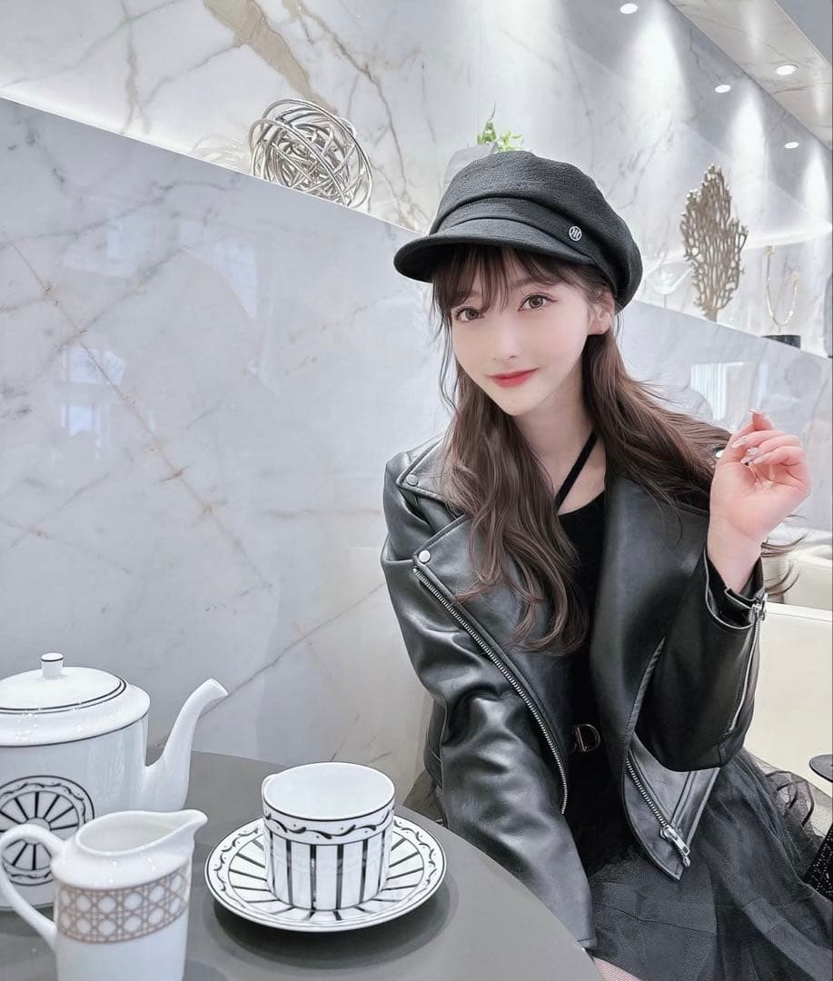 Riu ブラックニット長袖セーター 背中リボン付き