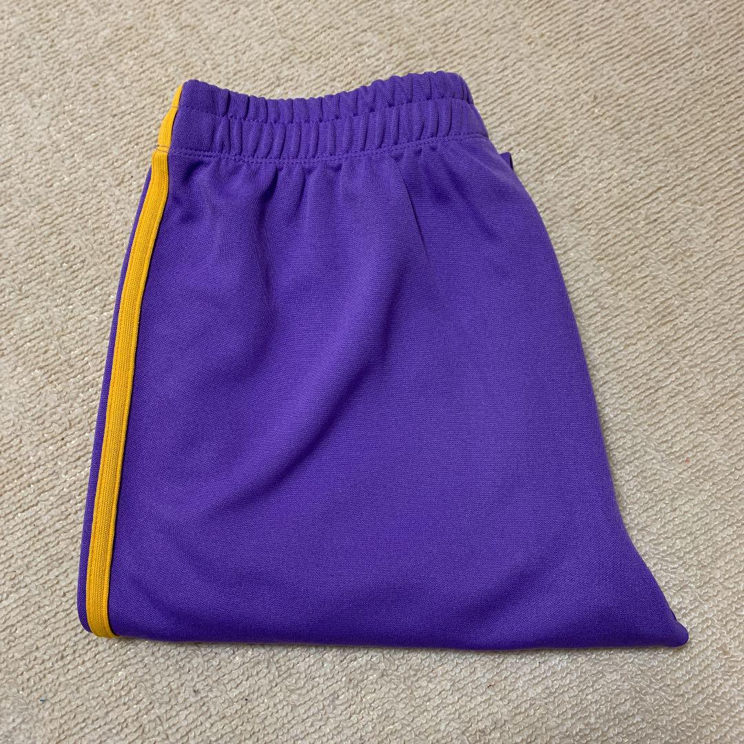 yellow and blue track pants