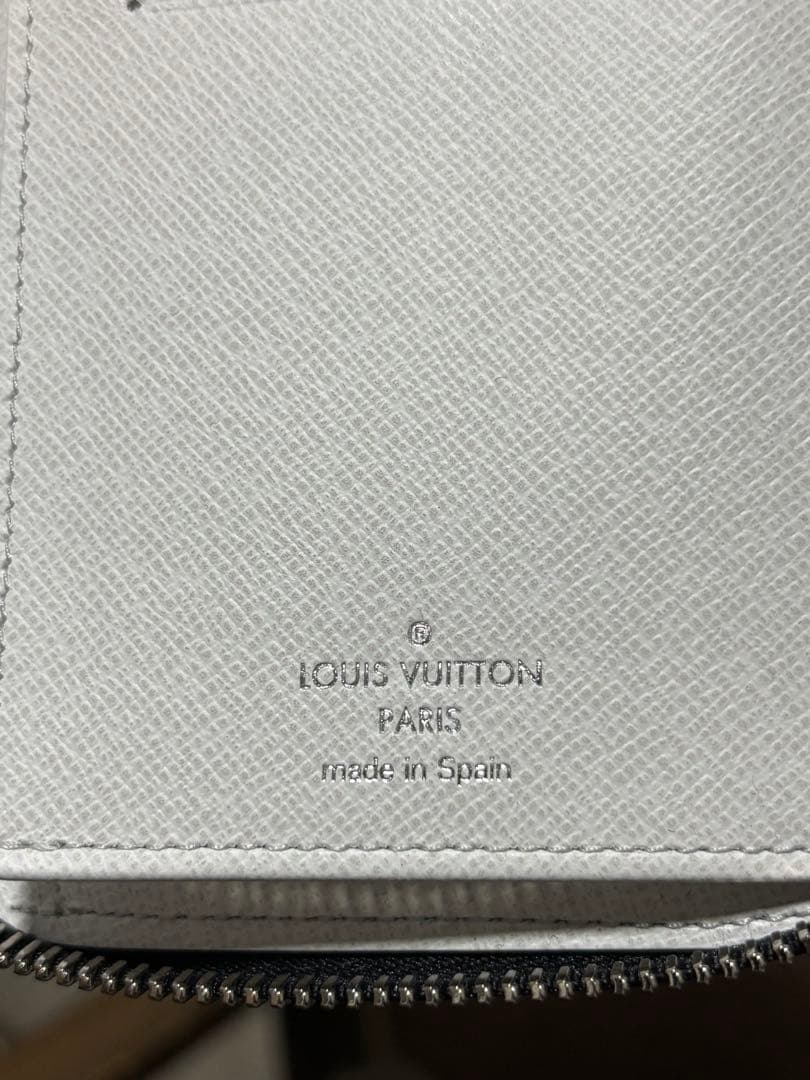 ルイ ヴィトン モノグラム タイガラマ ジッピーウォレット ヴェルティカル