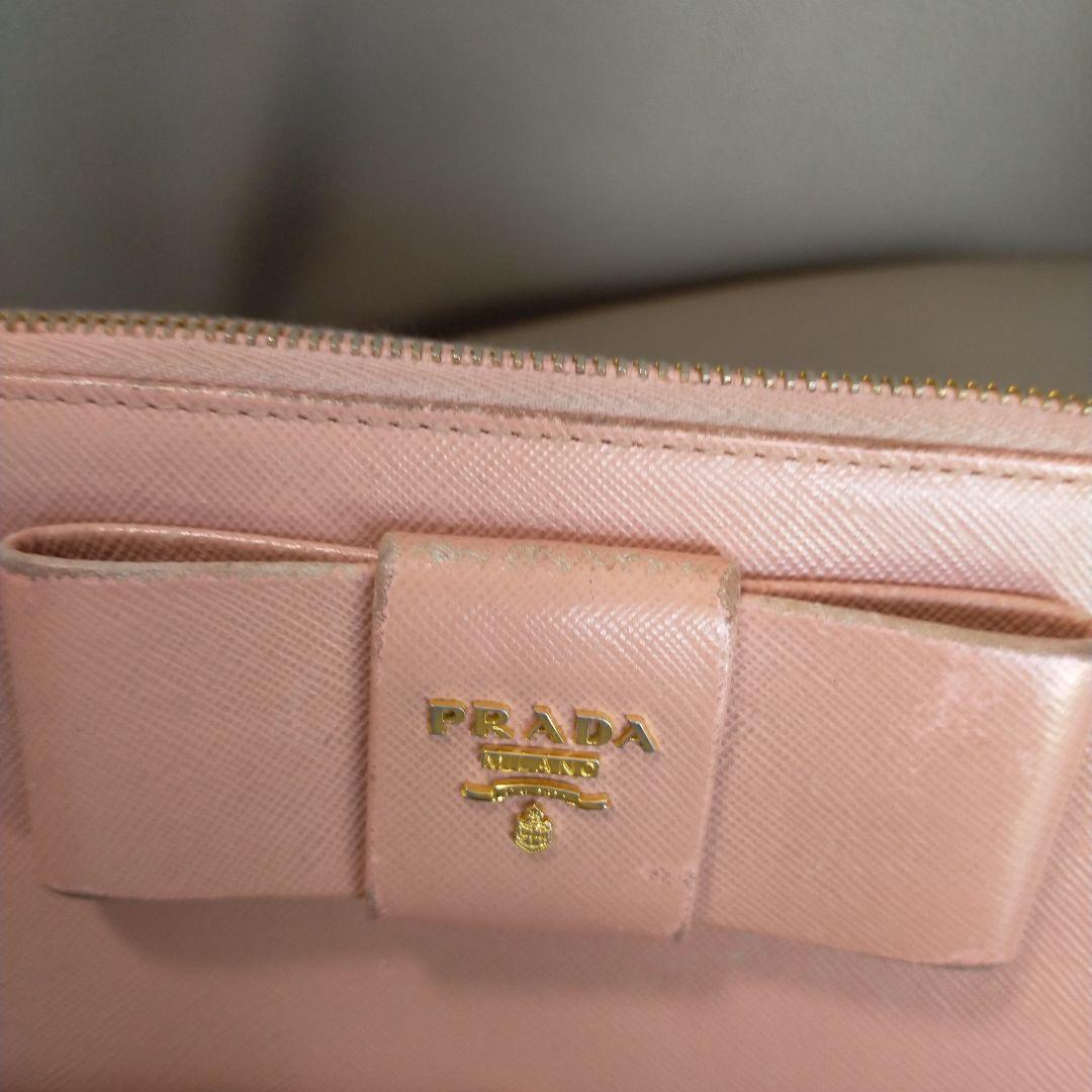 値下げ中【中古】PRADA ピンクラウンドファスナー長財布