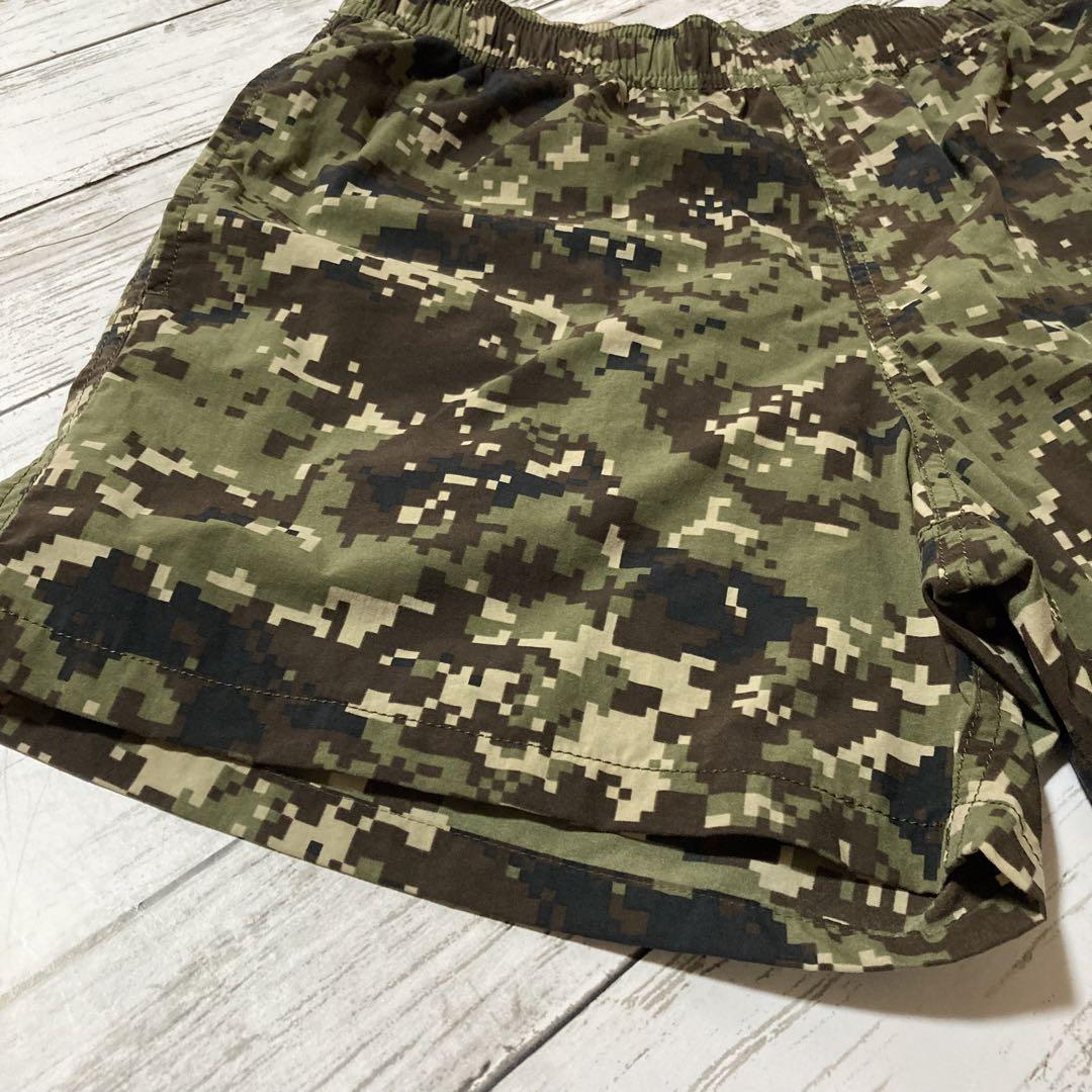 【美品】ザノースフェイス メンズ M ノベルティバーサタイルショーツ デジカモ