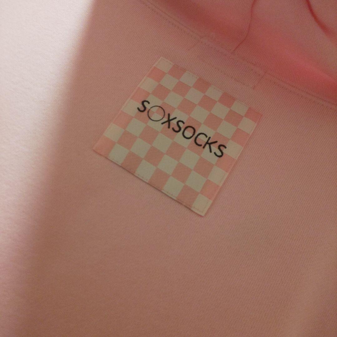 ヘラヘラ三銃士 S〇XSOCKS コラボ 愛、示しーや パーカー ピンク 購入可能 まりな ピンク パーカー 愛、示しーや コラボ S〇XSOCKS ヘラヘラ三銃士 パーカー