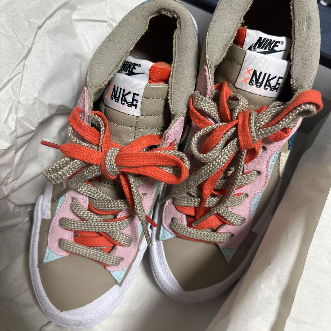 KAWS × sacai × Nike Blazer Low Reed