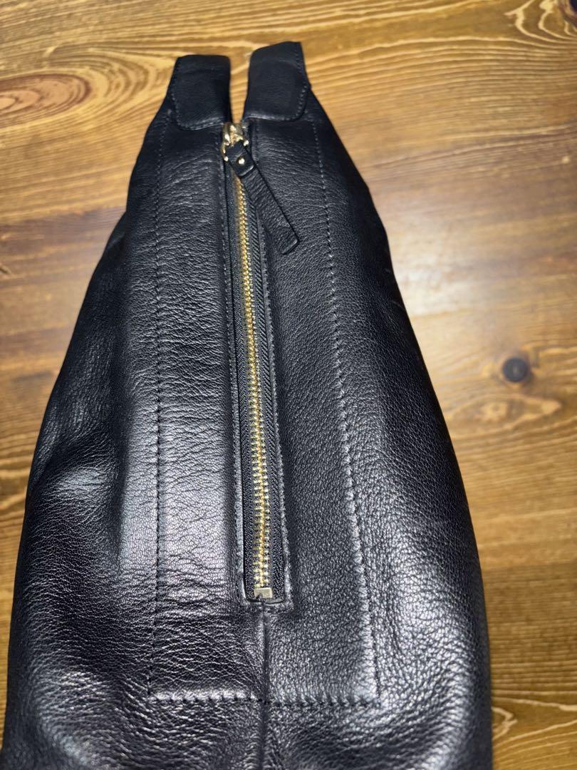 kate spade 黒のレザーバッグ ドット柄内装