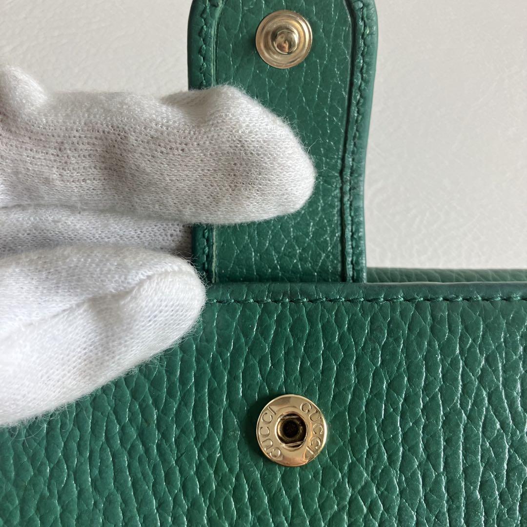 GUCCI インターロッキングG ダラーカーフ 二つ折り財布 615525