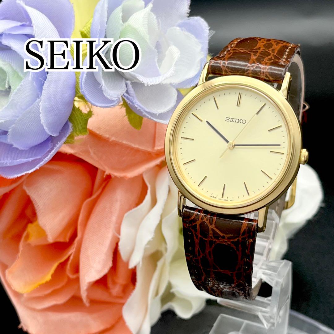 稼動 腕時計　SEIKO セイコー　ゴールド　新品電池　ラウンド 　D56